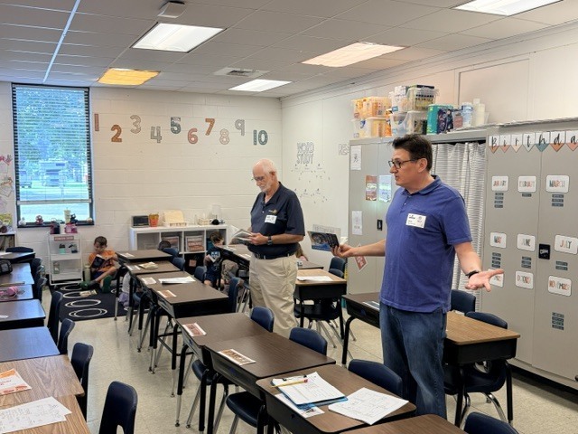 West Point Rotary talking to students about dictionaries