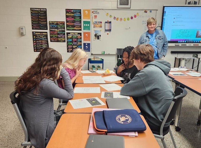 Students from Ms. Ambrose’s English 12 DE classes participating in a college admission simulation