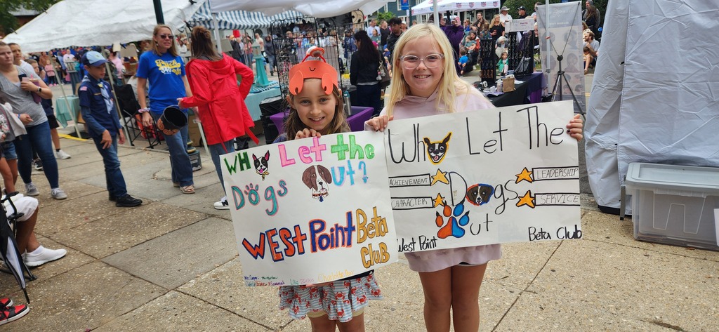 Two West Point Public Schools BETA students proudly represent WPPS at the Crab Carnival, showing their Pointer Pride and community spirit.