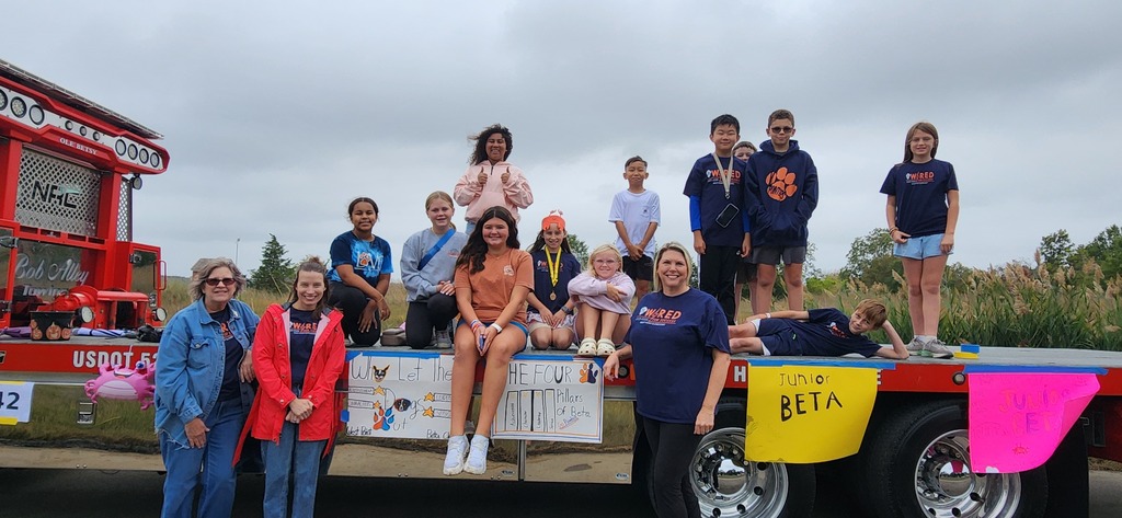 West Point Public Schools BETA students proudly represent WPPS at the Crab Carnival, showing their Pointer Pride and community spirit. Students and staff members standing with their crab carnival flatbed float