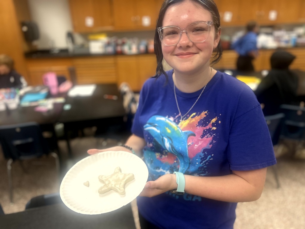 student with her 3D model of a living organism