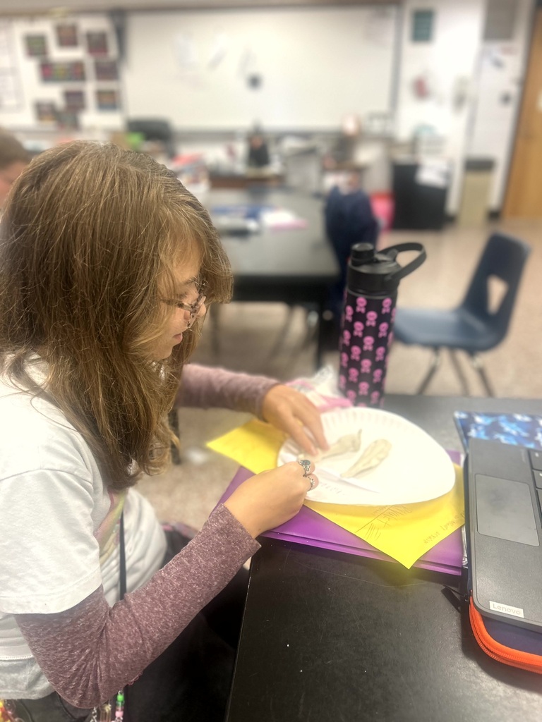 student with her 3D model of a living organism