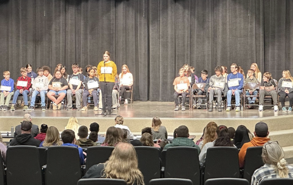 Students on stage at the spelling bee