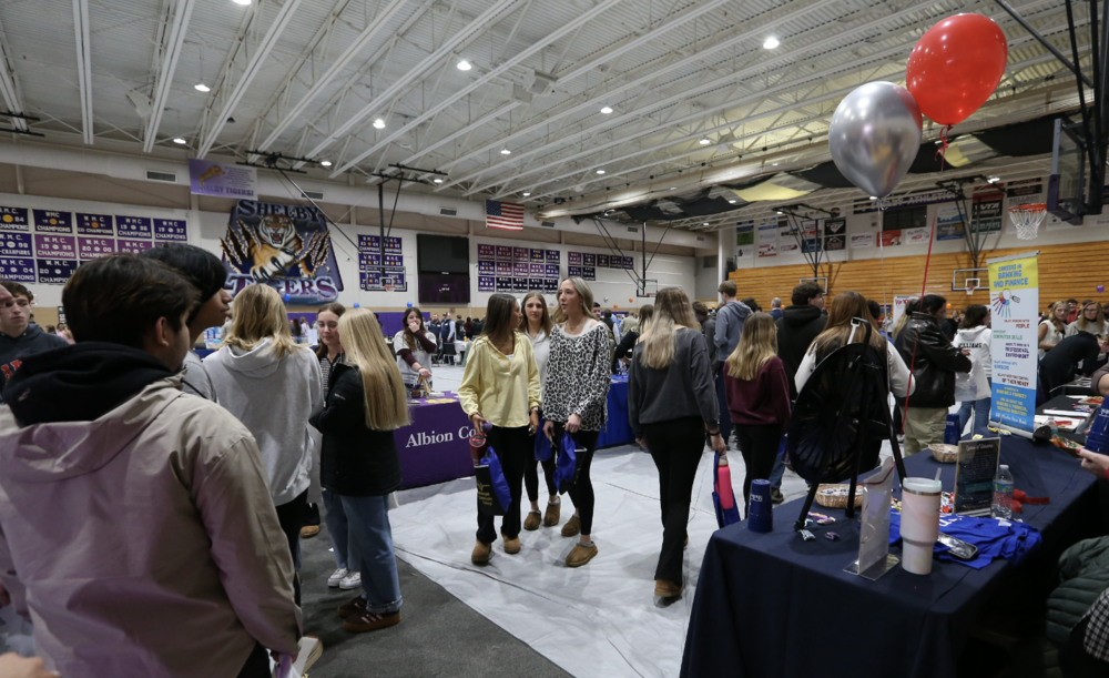 Crowd of students walking around the career fair.