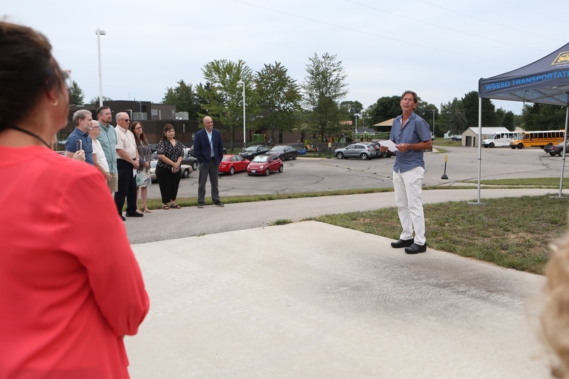 Dr. Mark Forner talking to crowd for tree dedication