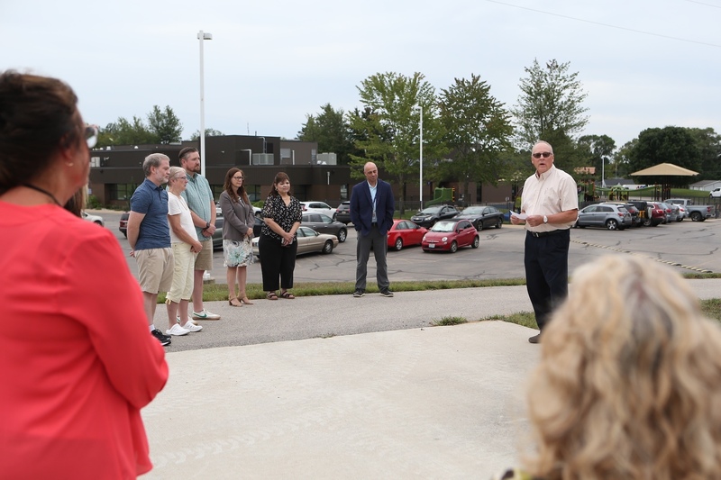 ESD Board President Jim Riffle speaking to crowd at the tree dedication