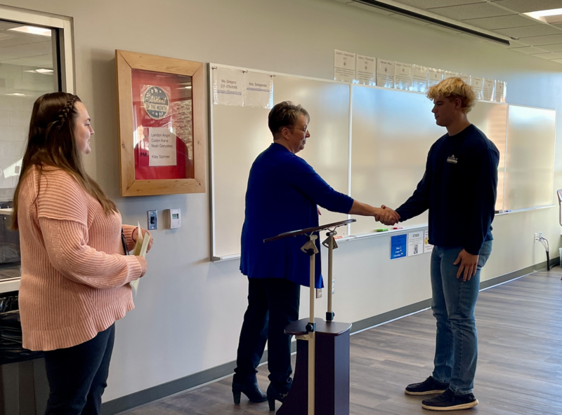 Student shaking hands