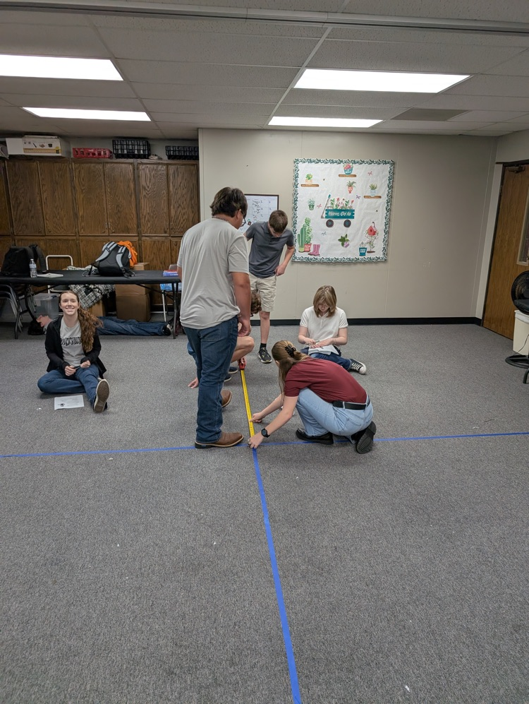 Geometry students doing some measuring