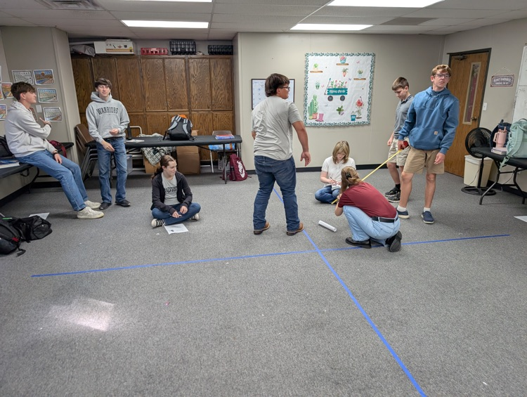 Geometry students doing some measuring