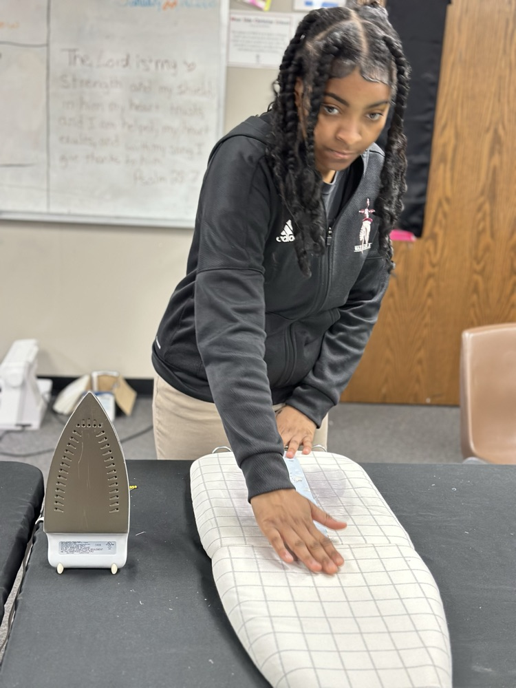 Geometry girls learning how to sew 