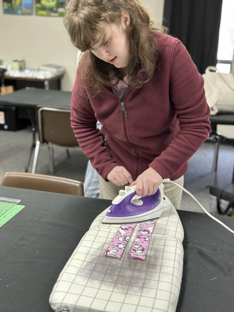 Geometry girls learning how to sew 