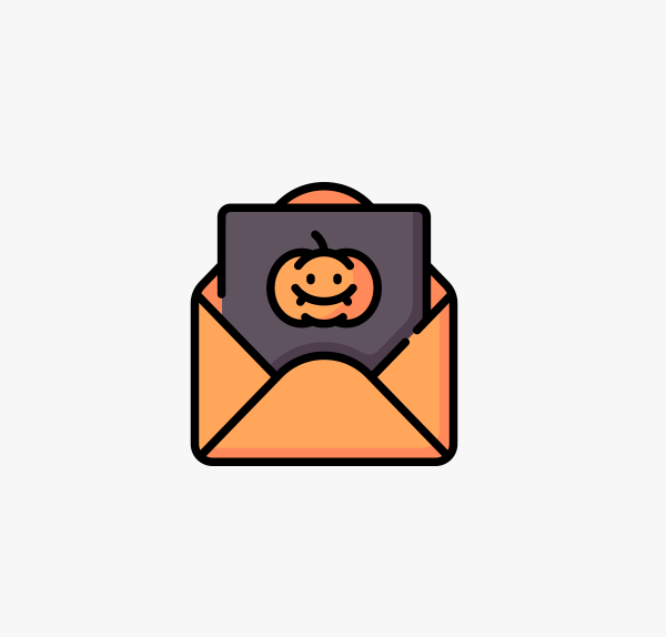 Orange envelope with a picture of a pumpkin inside