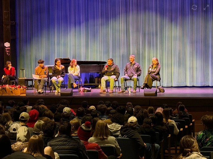 Moderators and Panelists sitting on the theater stage at a Future Ready Week event