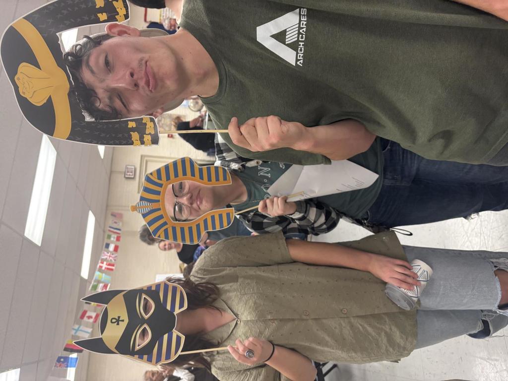 Students pose with Egyptian attire.