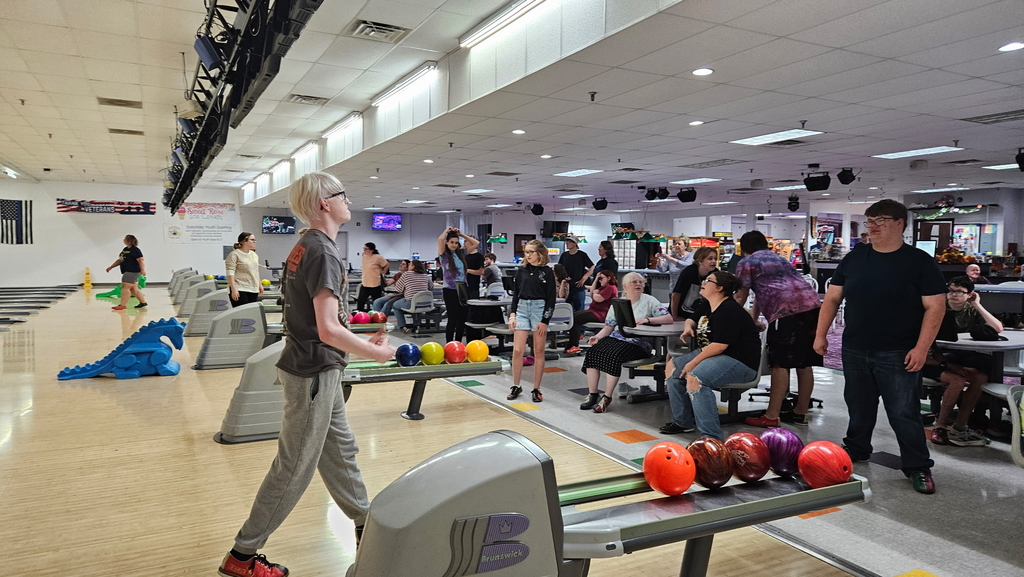 Students enjoying themselves at the bowling alley.