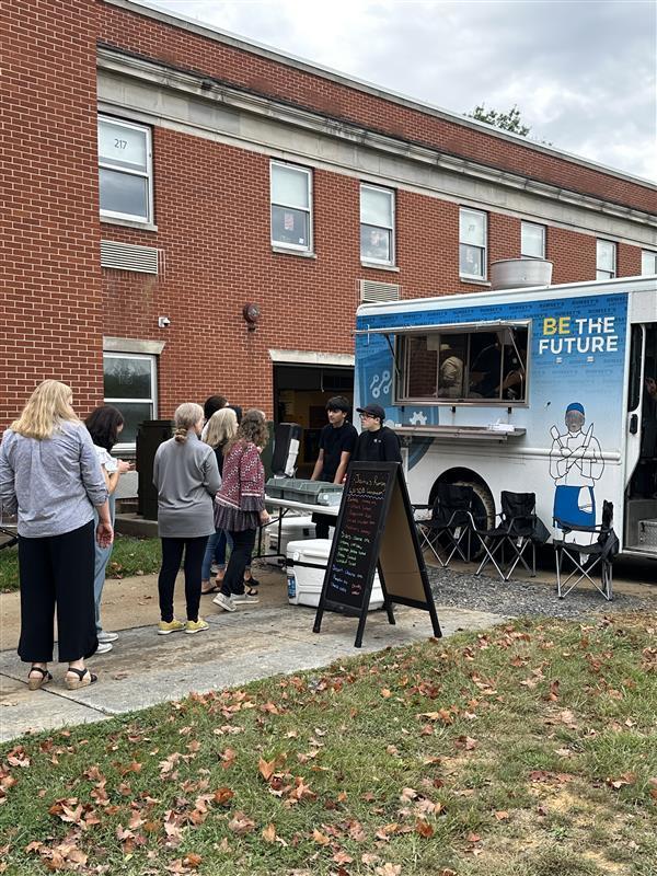 Fall Conference attendees lined up to order their food from the James Rumsey food truck.
