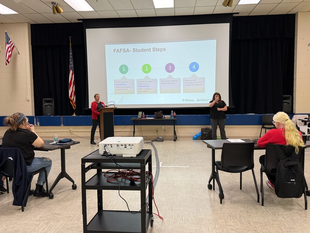 Participants observe a presentation on "FASFA."