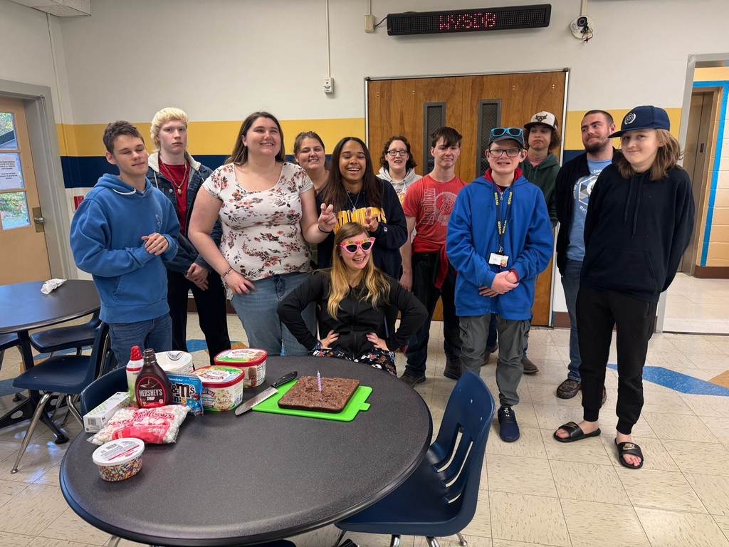 A group photo of CAP students celebrating one of their peers' birthdays.