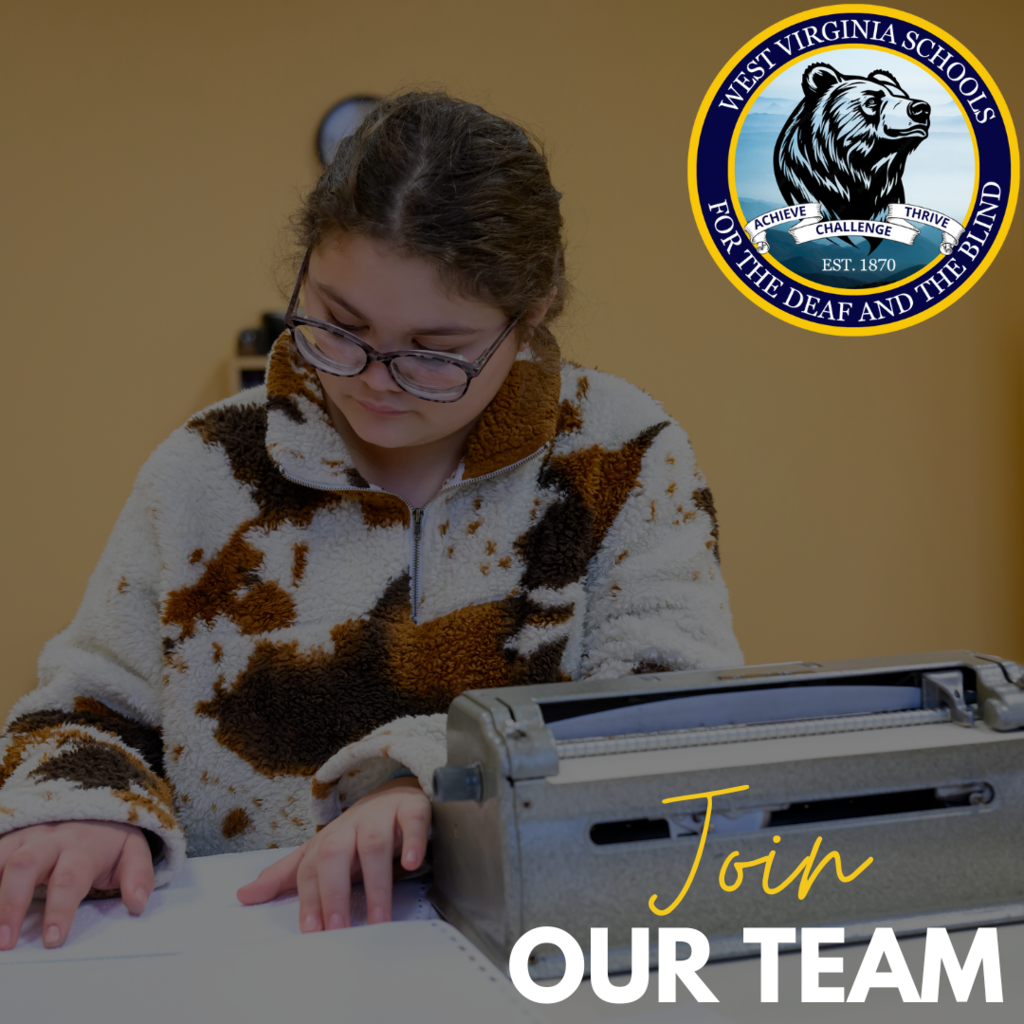 Student at desk reading Braille page with Brailler in front with Join Our Team banner. 