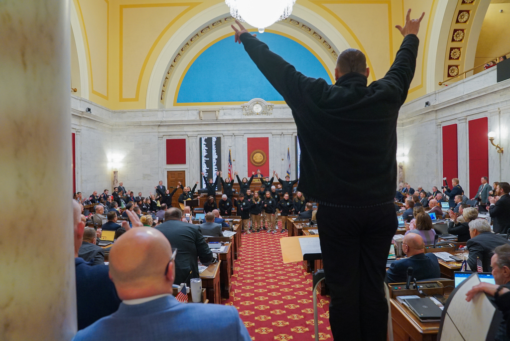 Individuals watching WVSDB students perform. 