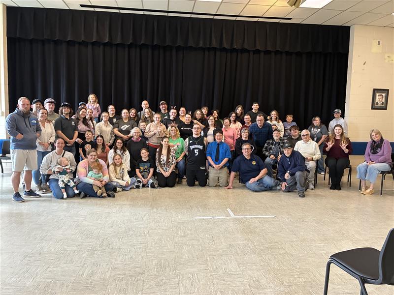 Group photo of the Deaf Social participants in the Brannon Building Auditorium.