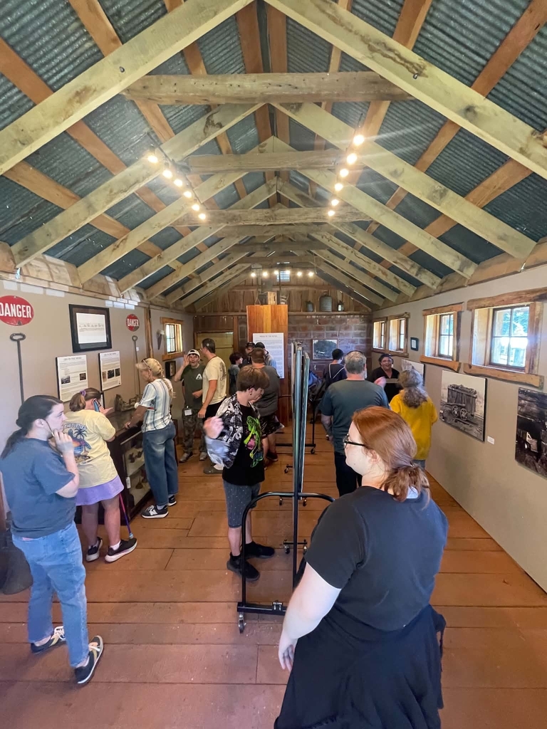 Students looking around a museum at the Evergreen Heritage Center.