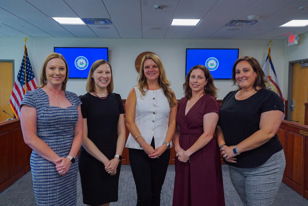 Five West Virginia Teacher of the Year finalists pose together in a meeting room. Heather Hartman of WVSDB stands second from the right.