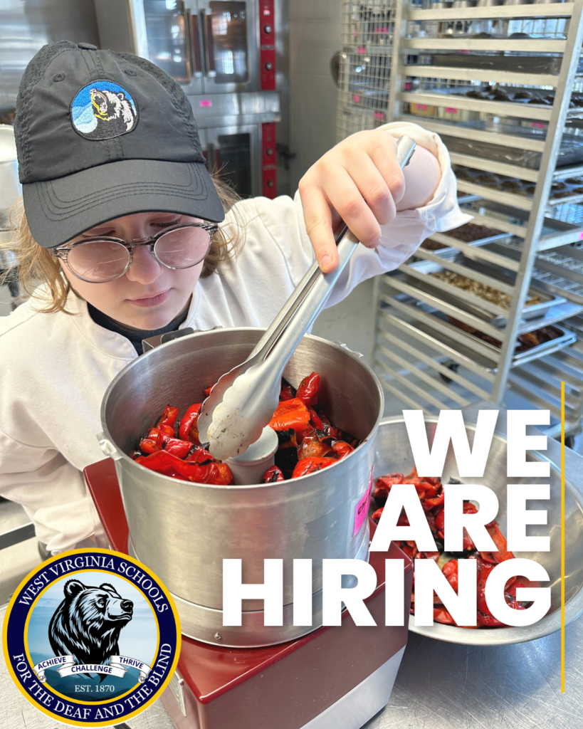 Student working in the kitchen with bear logo and we are hiring banner