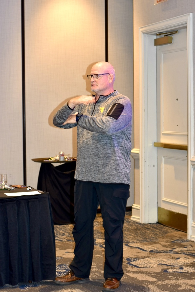 A presenter uses sign language while leading a session at the 2026 WVSDB Interpreter Summit.