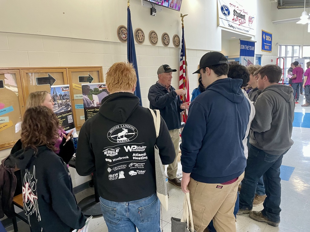 WRVC students speaking with the R.J. Grondin & Sons representative!