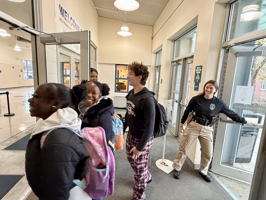 Crim J students greeting and opening doors for all WRVC students