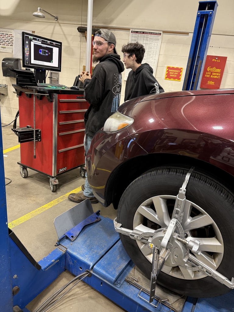 Auto Tech students diagnosing a customer's alignment