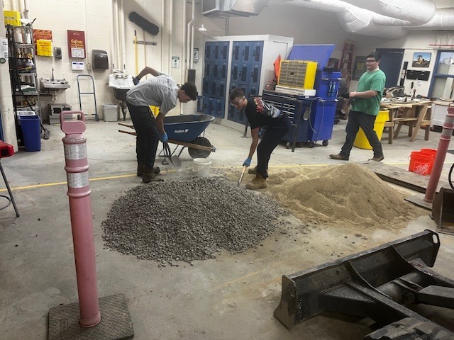 HEO creating a concrete bench