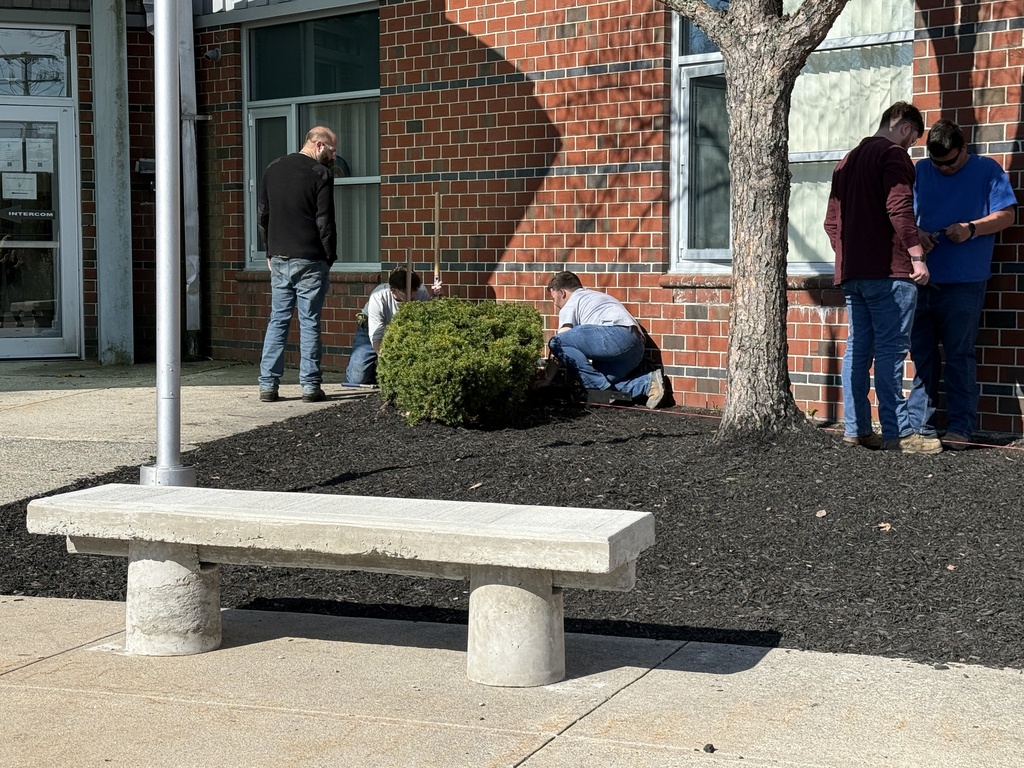 HEO students working on drip-edge stone work