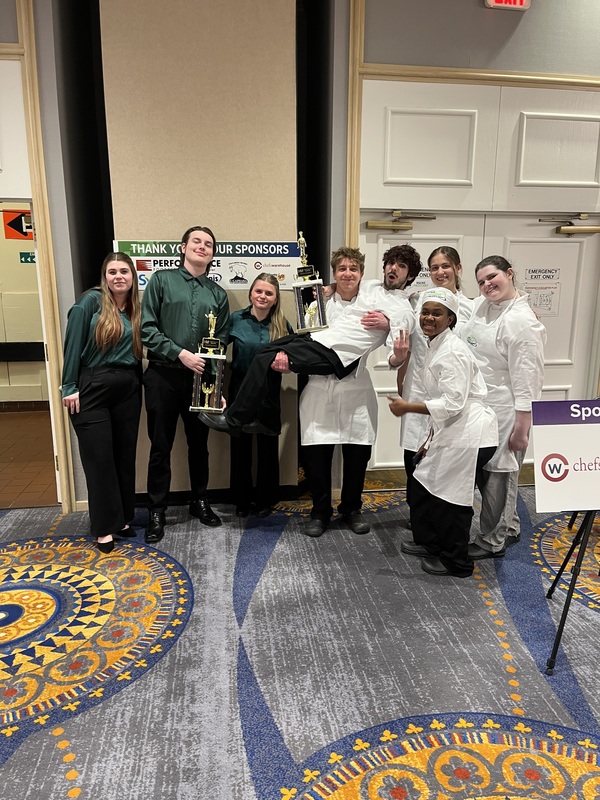 Culinary ProStart Challenge group w/trophies