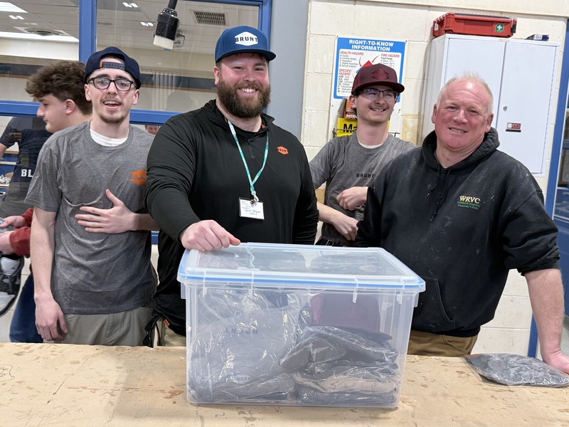 Cameron from BRUNT handing out swag to students!