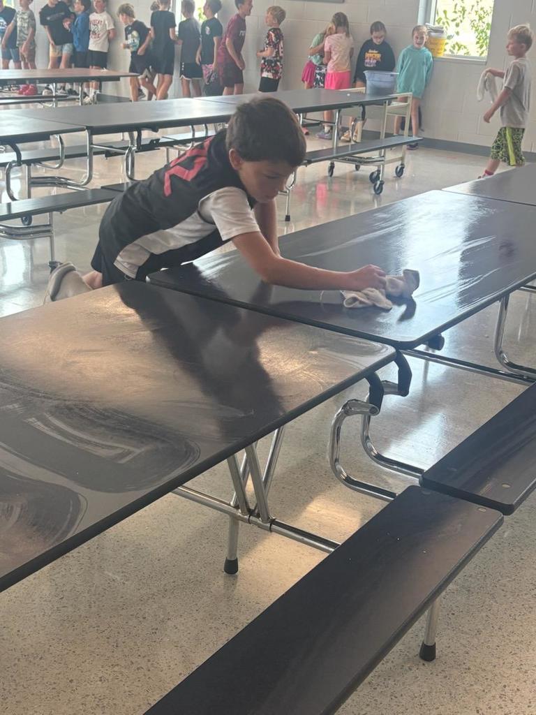 Students washing table