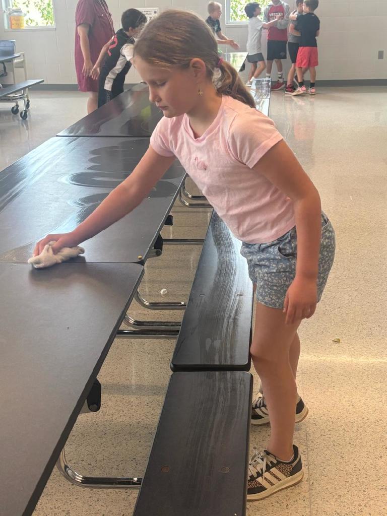Students washing table