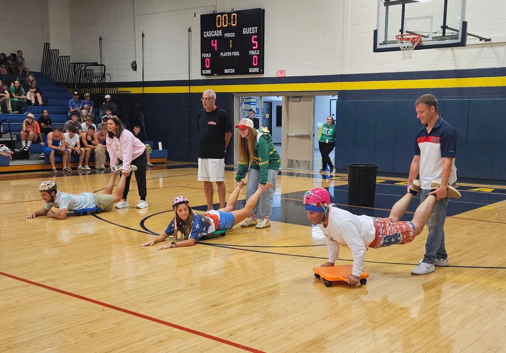 Students playing games in the gym