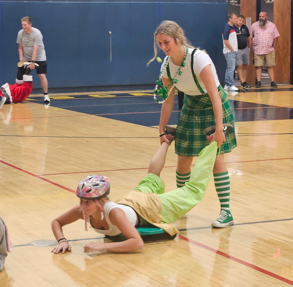 Students playing games in the gym