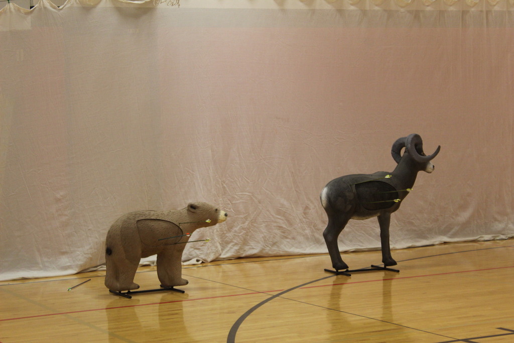 PE is learing about archery with Coack K. 