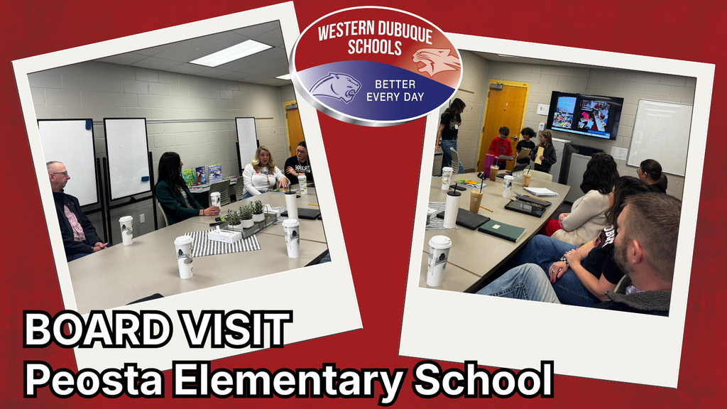 Board members sitting around a table listening to a presentation. 