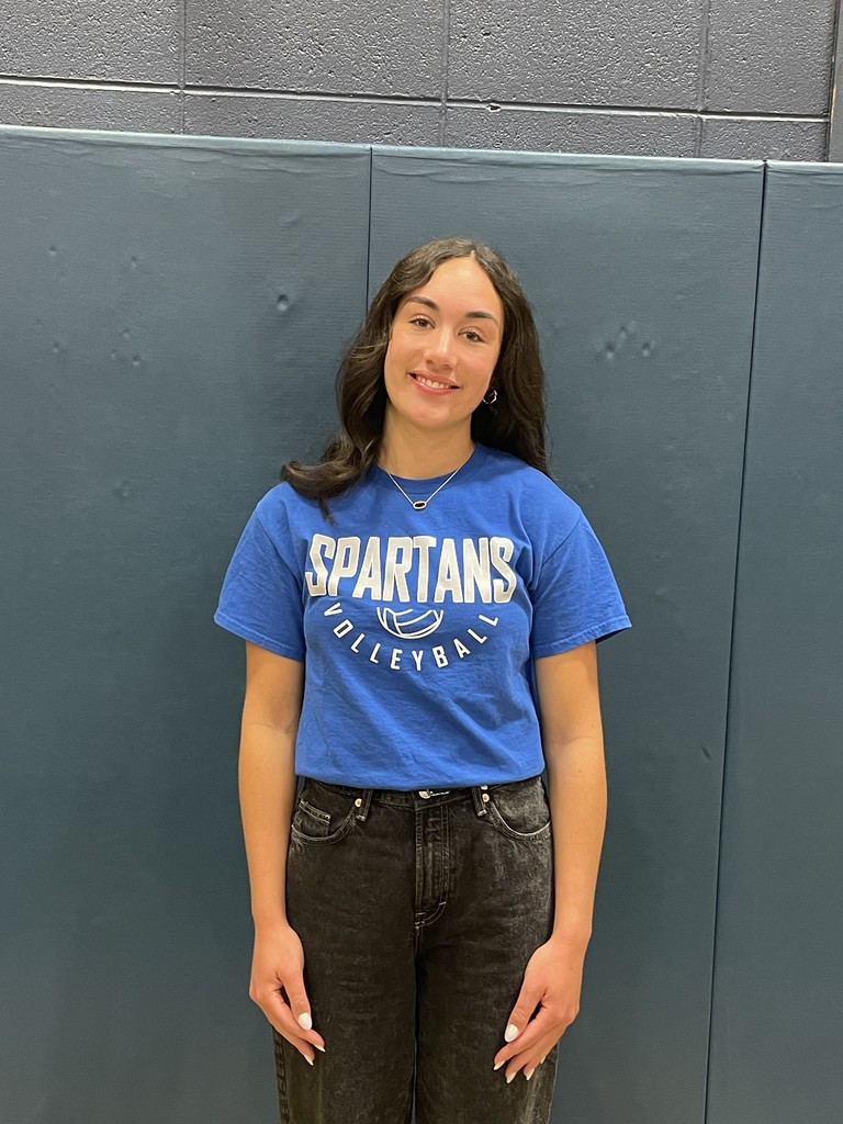Student wearing a Spartans volleyball shirt.