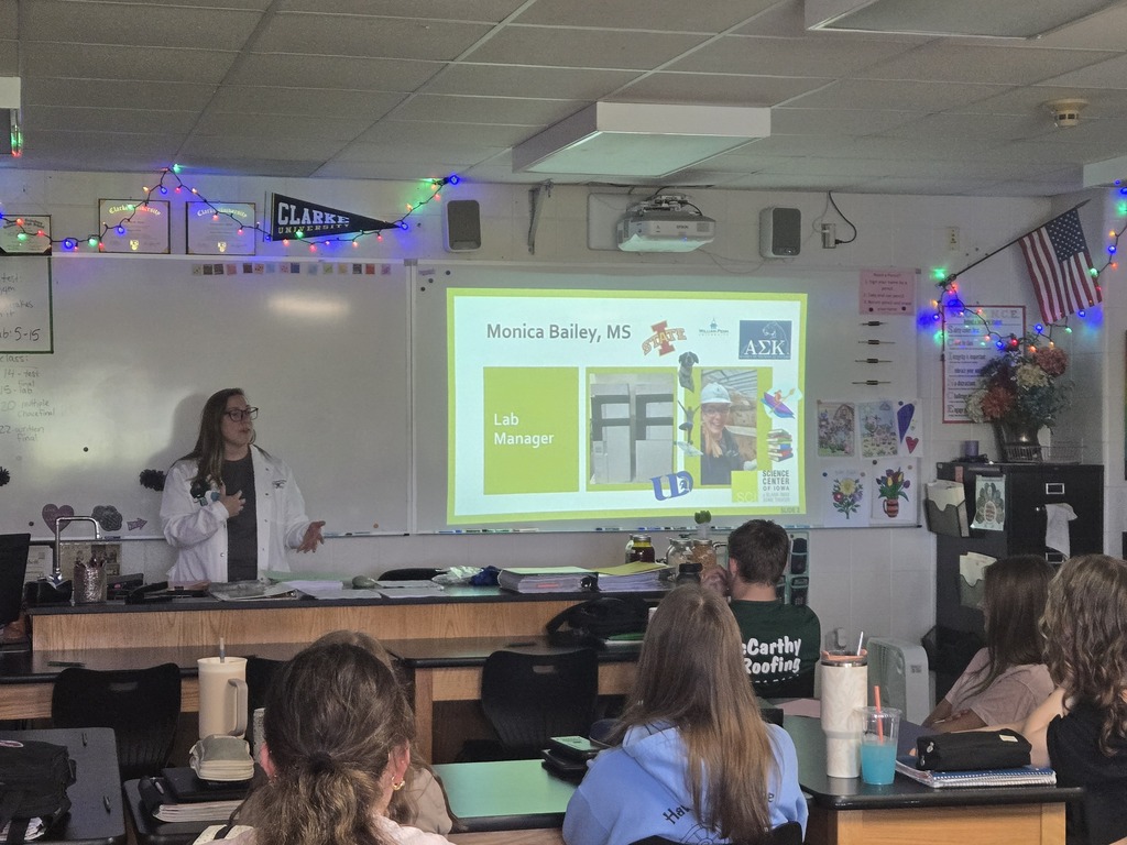Woman presenting to class