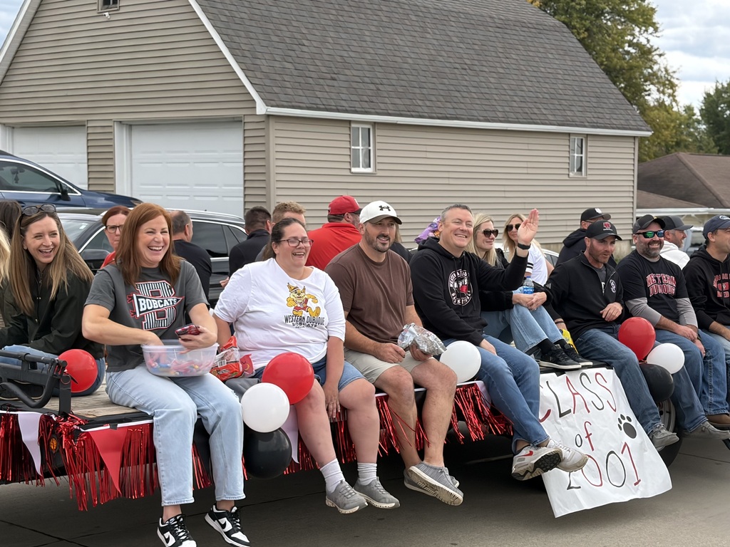 Adults on a parade float