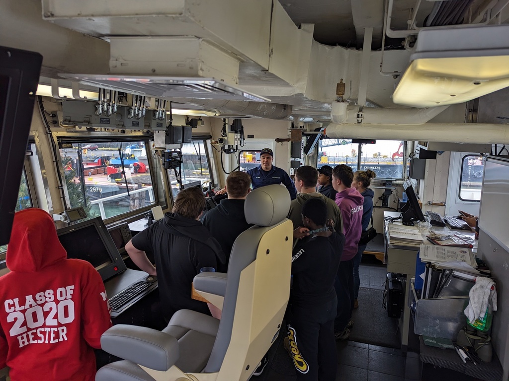 Cadets explore the bridge of the NEAH BAY