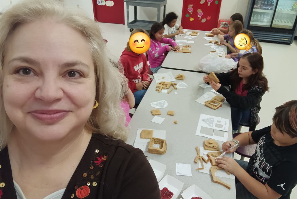 Teacher Ms. Hawkins with ziggurat builders