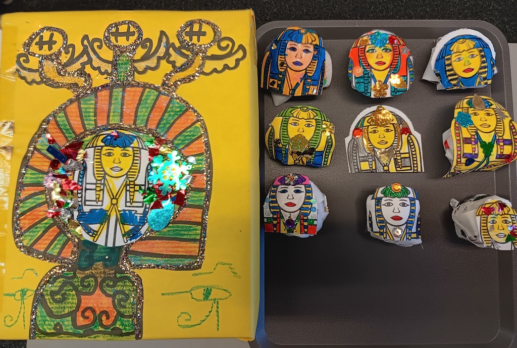 Sarcophagus and apple mummies