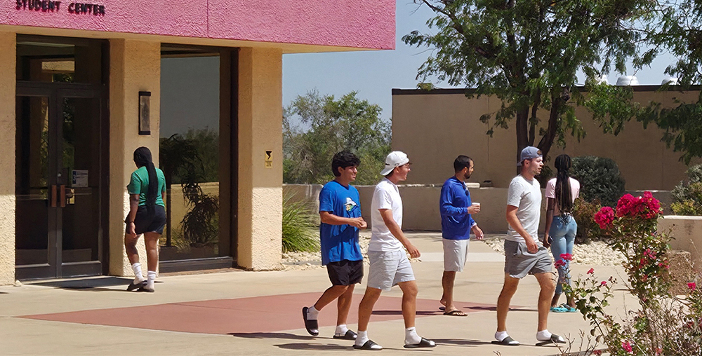 Students walking outside the Student Center on the Western Texas College campus.