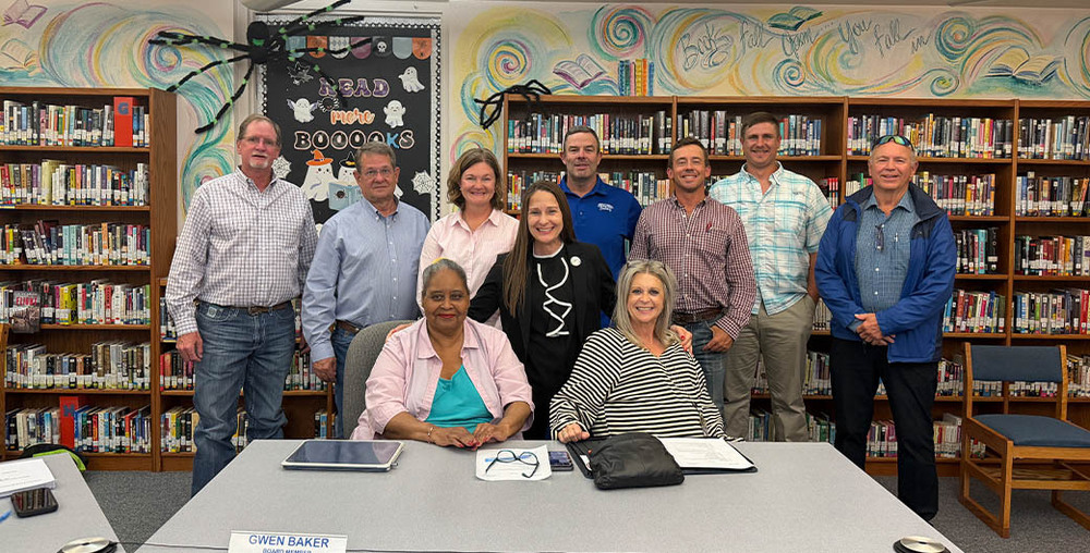 WTC President Dr. Laurie Sharp (center, in black) with the Stamford ISD Board of Trustees.